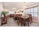 Dining room with wooden table, chairs, and view into living room at 889 Brunswick Dr, Rock Hill, SC 29730