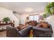 Living Room with staircase, sectional sofa, and decorative accents at 889 Brunswick Dr, Rock Hill, SC 29730