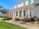 Two-story house with a large front porch and brick steps leading to the entrance at 116 Cedar Branch Ct, Mooresville, NC 28117