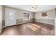 Living room with hardwood floors and neutral walls at 1716 Maxton Ave, Gastonia, NC 28052