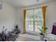 Home office with large window providing ample natural light and view of backyard at 2015 Mallard Pine Ct, Charlotte, NC 28262