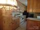 Kitchen with wood cabinets and tile floors at 211 Walnut Ave, Mount Holly, NC 28120