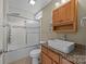 Bathroom with a tub, shower, and granite vanity at 2740 Bramble Ridge Ct, Charlotte, NC 28215