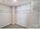Walk-in closet with wire shelving providing ample storage at 7224 Hodges Meadow Ln, Charlotte, NC 28213