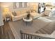 Living room with sectional sofa, coffee table, and gray area rug at 7224 Hodges Meadow Ln, Charlotte, NC 28213