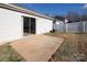 Small back patio adjacent to sliding glass door at 13502 Tartarian Ct, Charlotte, NC 28215