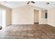 Bright living room featuring tile floors and an open floor plan at 13502 Tartarian Ct, Charlotte, NC 28215