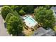 Community swimming pool with lounge chairs and shaded areas at 14752 Lions Paw St, Charlotte, NC 28273