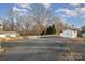 Spacious backyard with shed and parking area at 155 Mcadam Ln, Mooresville, NC 28117