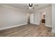 Spacious bedroom with ensuite bathroom access and ceiling fan at 155 Mcadam Ln, Mooresville, NC 28117