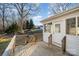 Wooden deck overlooks backyard, access from back door at 155 Mcadam Ln, Mooresville, NC 28117