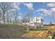 House exterior with large backyard and trees at 155 Mcadam Ln, Mooresville, NC 28117