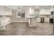 Modern kitchen with white cabinets and granite countertops at 155 Mcadam Ln, Mooresville, NC 28117