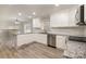 Spacious kitchen with white cabinets and granite countertops at 155 Mcadam Ln, Mooresville, NC 28117