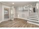 Living room with hardwood floors and access to the kitchen at 155 Mcadam Ln, Mooresville, NC 28117