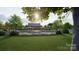 Resort-style pool with surrounding lounge chairs and umbrellas at 1980 Copper Path Dr, Fort Mill, SC 29715