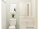 Simple bathroom, featuring a white vanity, toilet and shower at 1984 Copper Path Dr, Fort Mill, SC 29715