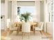 Bright dining room with round table and six chairs, wood flooring at 1984 Copper Path Dr, Fort Mill, SC 29715