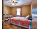 Cozy bedroom with a double bed and hardwood floors at 38899 Dalton Ln, Albemarle, NC 28001