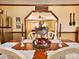 Charming dining area, showcasing a rustic table setting and decorative centerpiece at 38899 Dalton Ln, Albemarle, NC 28001