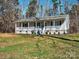 Cozy ranch home with a welcoming porch and landscaped yard at 38899 Dalton Ln, Albemarle, NC 28001
