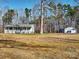 Gray ranch home on a spacious lot with a detached garage at 38899 Dalton Ln, Albemarle, NC 28001