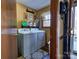 Laundry room with washer, dryer, and shelving at 38899 Dalton Ln, Albemarle, NC 28001