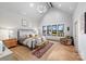 Spacious primary bedroom with high ceilings and large windows at 5001 Doris Ave, Charlotte, NC 28205