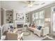 Living room features a fireplace, built-ins, and a comfy off-white sofa at 837 Park Slope Dr, Charlotte, NC 28209