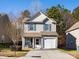 Two-story house with gray siding, white trim, and a two-car garage at 269 Makayla Ct, Fort Mill, SC 29715