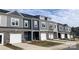 New townhome community with attached garages, and neutral siding at 2723 Winn Mill Dr # 47, Gastonia, NC 28056