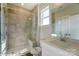 Bathroom boasts a large shower with built-in seat and a vanity with sink at 3237 Mcharney Dr # 29, Harrisburg, NC 28075