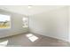 Well-lit bedroom with carpet flooring and two large windows at 3237 Mcharney Dr # 29, Harrisburg, NC 28075