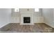 Fireplace with white mantel and built-in cabinets at 3237 Mcharney Dr # 29, Harrisburg, NC 28075