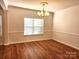 Formal dining room with hardwood floors and a chandelier at 3440 Pickney Bluff St, Fort Mill, SC 29715