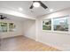 Bright dining area with light hardwood floors and large windows at 3600 Braden Dr, Charlotte, NC 28216