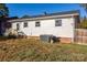 Home's back exterior showcasing a deck and HVAC unit at 424 Wilson St, Statesville, NC 28677