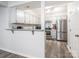 Kitchen with stainless steel appliances and light cabinets at 7223 Winery Ln, Charlotte, NC 28227