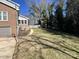 Large backyard with a grassy area and mature trees at 1364 5Th Street Nw Cir, Hickory, NC 28601