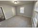 Spacious bedroom with neutral walls and carpeting at 1364 5Th Street Nw Cir, Hickory, NC 28601