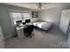 Bedroom with a desk and bed, hardwood floors at 1364 5Th Street Nw Cir, Hickory, NC 28601