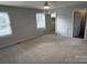 Large bedroom with ceiling fan and walk-in closet at 1364 5Th Street Nw Cir, Hickory, NC 28601