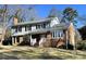 Brick house with gray siding, white trim, and a spacious yard at 1364 5Th Street Nw Cir, Hickory, NC 28601