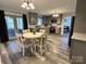 Updated kitchen with gray cabinets and a breakfast area at 1364 5Th Street Nw Cir, Hickory, NC 28601