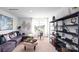 Spacious bonus room with sectional sofa and built-in shelving at 1373 6Th Ne St, Hickory, NC 28601
