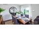 Bright dining room featuring hardwood floors and large windows at 1373 6Th Ne St, Hickory, NC 28601