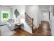 Open living space with stairs and hardwood flooring at 1373 6Th Ne St, Hickory, NC 28601