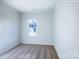 Bright bedroom featuring carpet and a window with natural light at 2711 Winn Mill Dr # 45, Gastonia, NC 28056