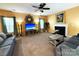 Cozy living room with fireplace and ample natural light at 3628 Benseval Ln, Matthews, NC 28105