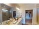 Elegant bathroom with double vanity, walk-in shower, and large closet at 8020 Plymouth Dr, Sherrills Ford, NC 28673